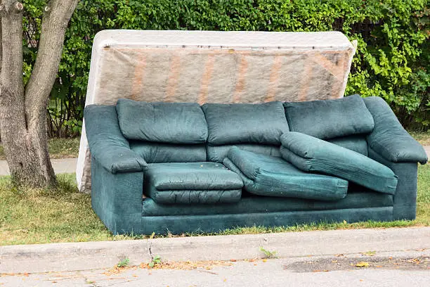 Photo of Abandoned Mattress and Couch