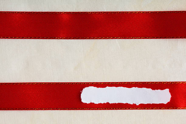 istock Piece scrap paper blank copy space red ribbon cloth background 492726329