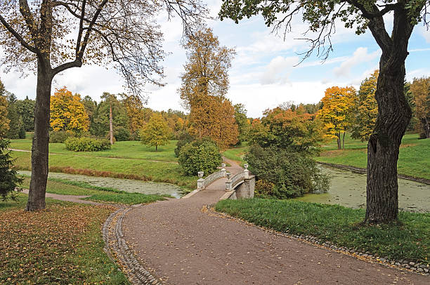 istock Footpath in old park, autumn 492726713