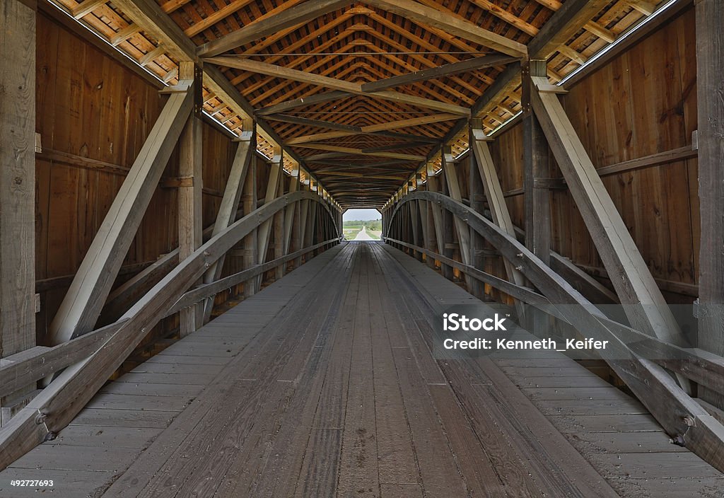 Covered Bridge Interior The wooden supporting architecture of covered bridge is viewed from the inside. This is Parke County, Indiana's Sanitorium Covered Bridge. Rockville - Maryland Stock Photo