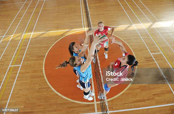 Girls Playing Volleyball Indoor Game Stock Photo - Download Image Now - Activity, Adult, Competition