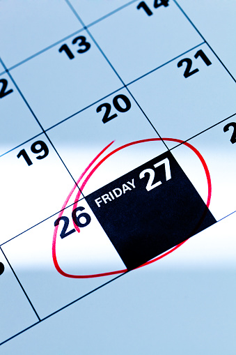 Black Friday Sale date marked on a calendar, November 27 Friday, 2015. The traditional Friday after Thanksgiving date is the kick off date for retailers for Christmas retail, the biggest Christmas shopping date of the holiday season. Close-up photography in horizontal format of a calendar page.