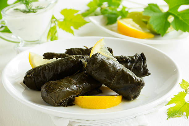 istock dolma, stuffed grape leaves, turkish and greek cuisine 492729557