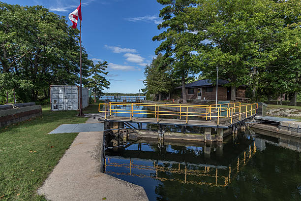 istock Boat lock with Canadian flag next to it 492730264