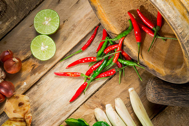 istock Chillies in Mortar with Pestle on wood. 492730290