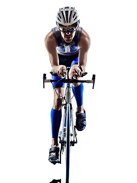 man triathlon iron man athlete bikers cyclists bicycling biking in silhouettes on white background
