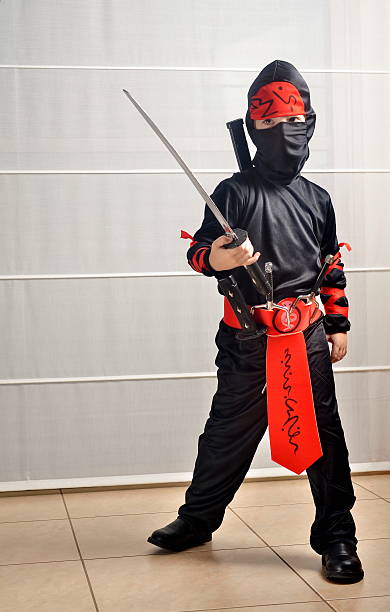 istock Boy dressed up for Halloween / Purim as a Ninja 492730789