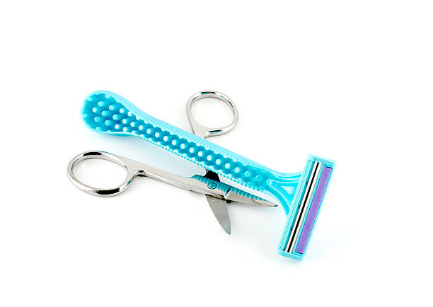 istock Blue razors for woman and scissors 492732213