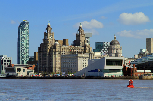 The beautiful Liverpool waterfront skyline as viewed from the River Mersey on board the world famous Mersey Ferry.