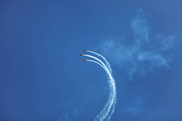 istock Three small sport airplane flying high in the sky 492733077