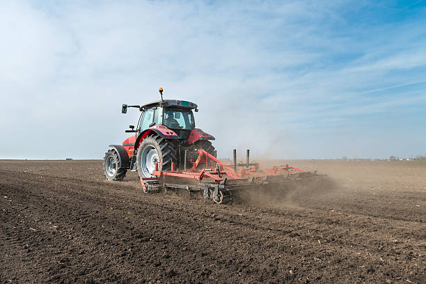 preparation of agricultural land preparation of agricultural land in the spring field stubble stock pictures, royalty-free photos & images