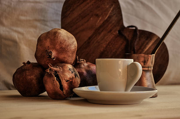 greek coffee and pomegranate in atmospheric light