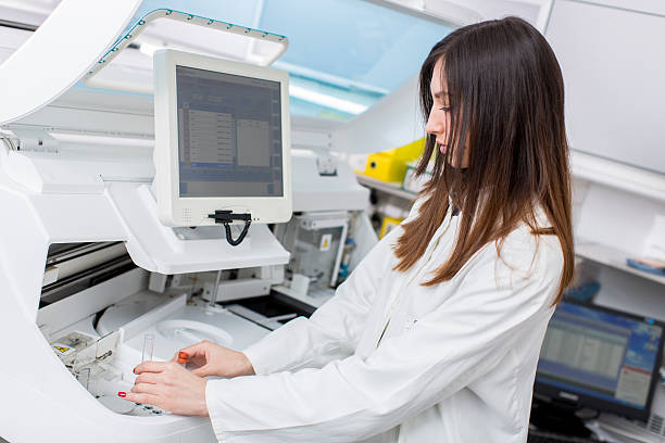 istock Young woman in medical laboratory 492733239
