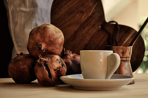 greek coffee and pomegranate in atmospheric light