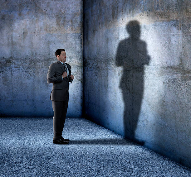 istock Businessman Afraid Of His Own Shadow 492733838