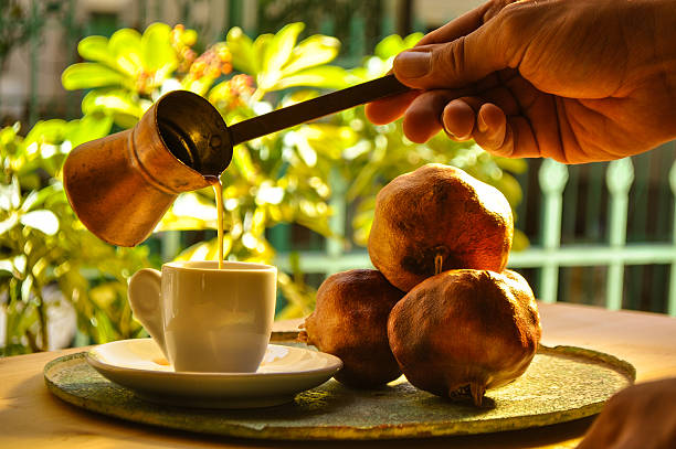 istock greek coffee and pomegranate in atmospheric light 492734096