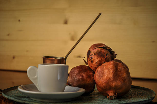 greek coffee and pomegranate in atmospheric light