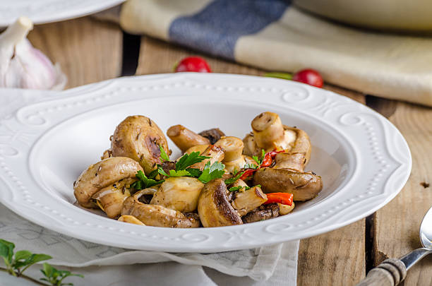 istock Fresh mushroom salad with chilli and herbs 492736308
