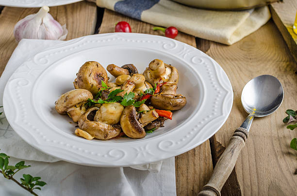 istock Fresh mushroom salad with chilli and herbs 492736478