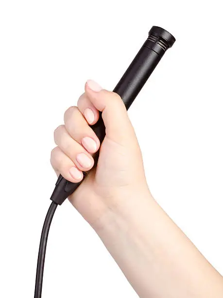 Photo of Hand with microphone