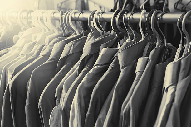 istock Clothes hang on a shelf in a designer clothes store 492738416