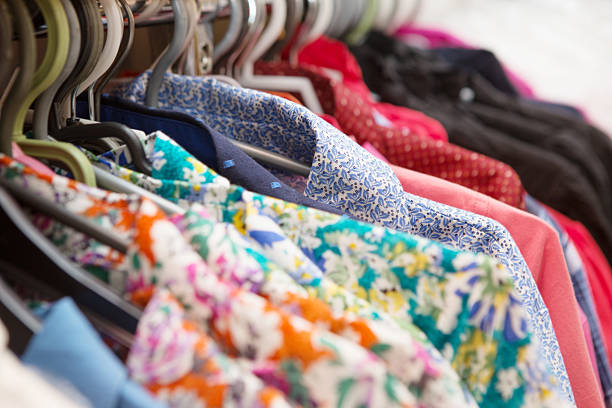 istock Clothes hang on a shelf in a designer clothes store 492738462