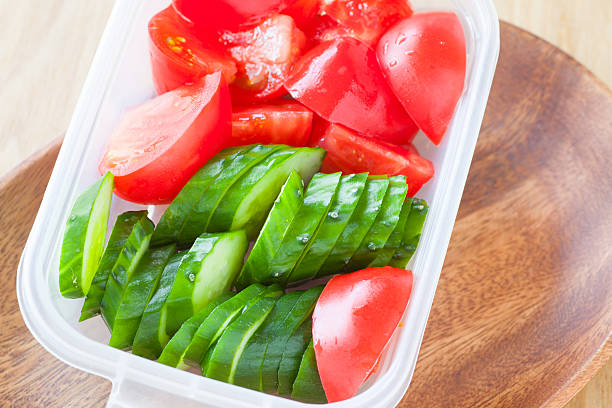 istock Slice cucumber  and slice tomato in plastic lunch box 492739894