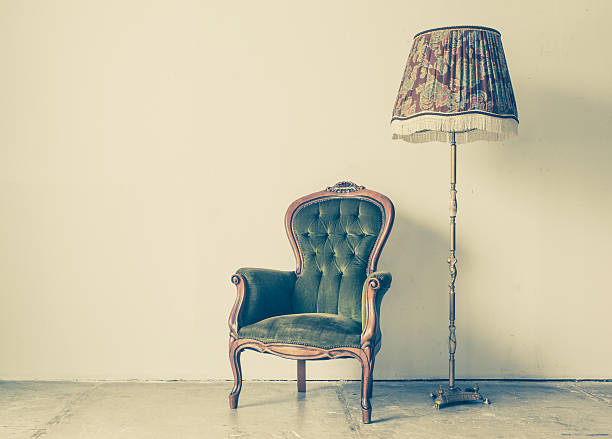 istock Vintage and antique chair with white wall background 492740022