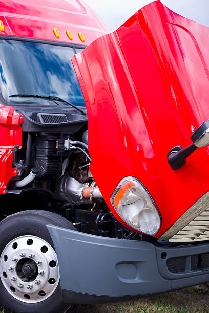 istock Super bright red modern semi truck engine under open hood 492740556