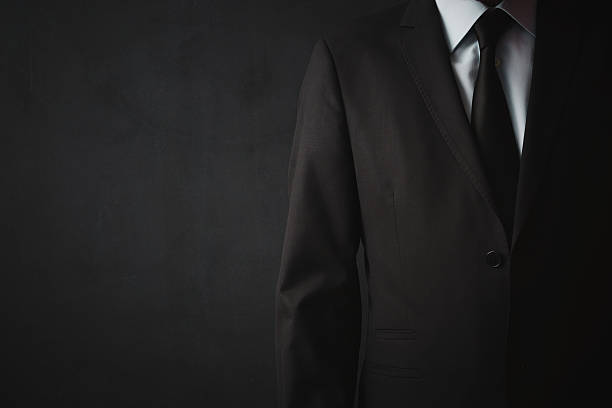 istock Businessman on black background 492740778