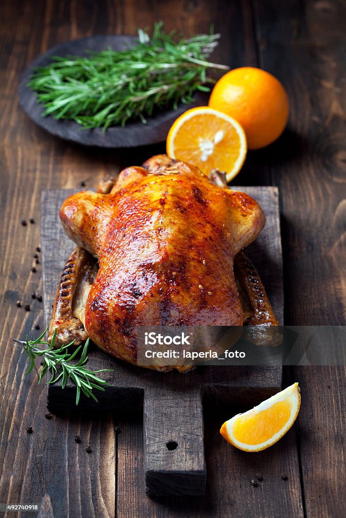 Roast duck Roast duck in orange glaze, selective focus Goose Meat Stock Photo