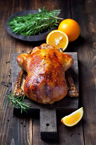 Roast duck in orange glaze, selective focus