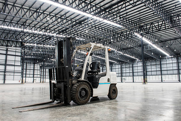 Forklift loader in large modern storehouse stock photo