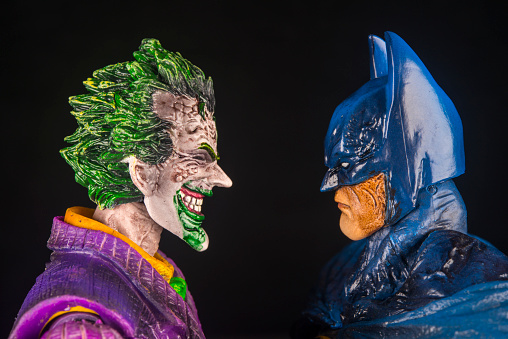 Notre Dame De Lile Perrot, Canada - October15, 2015: Horizontal studio shot of the Joker face to face with Batman from DC Comics.