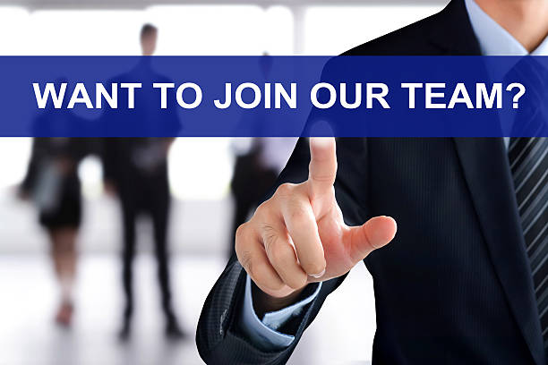 istock Businessman hand touching WANT TO JOIN OUR TEAM? messsage 492753318