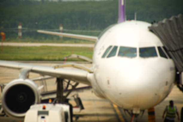 istock Abstract blurred airliner take a services on terminal 492755298
