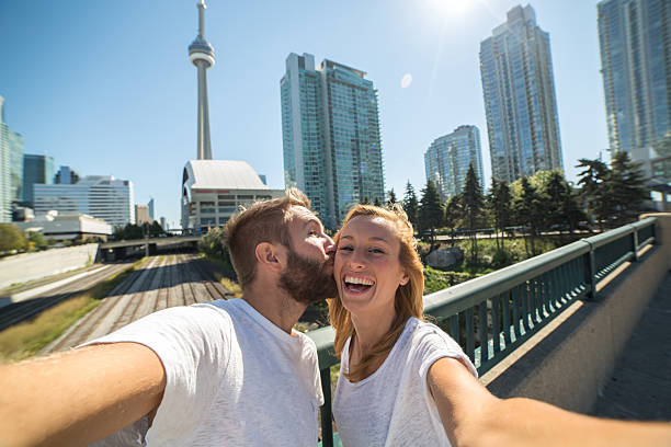 istock Happy lovers enjoying themselves in Toronto-Selfie 492758984