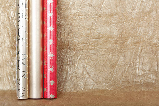 istock Rolls of multicolored wrapping paper for gifts 492760854