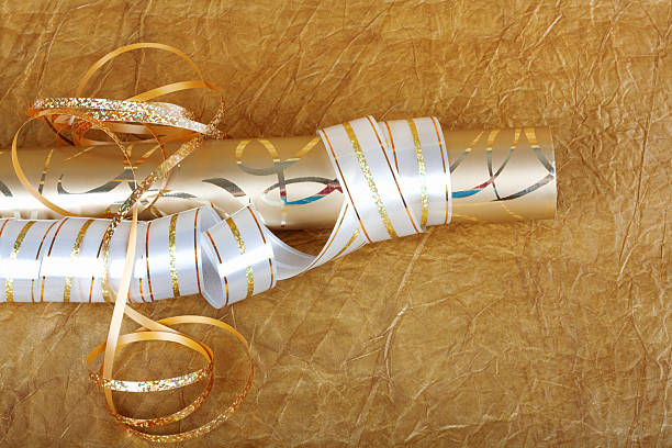 istock Rolls of multicolored wrapping paper for gifts 492761134