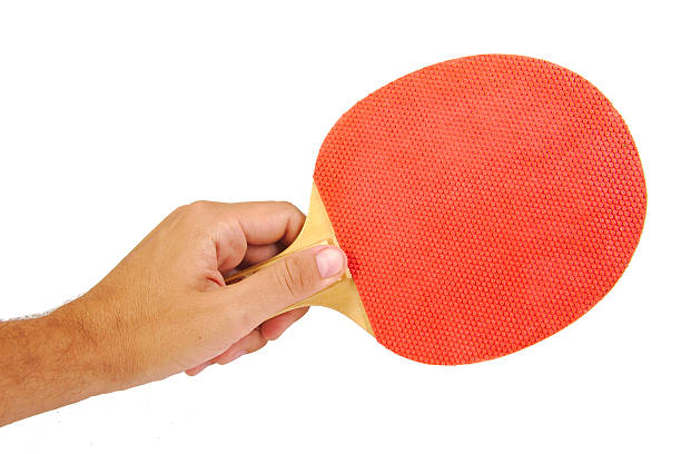 istock Hand holding a tennis racket isolated on white background 492761442