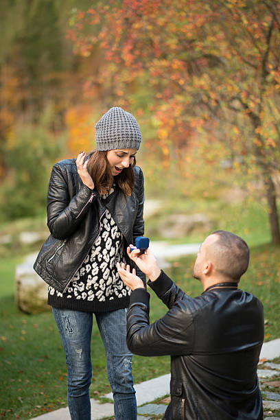 istock Autumn outdoor wedding proposal engagement 492764420