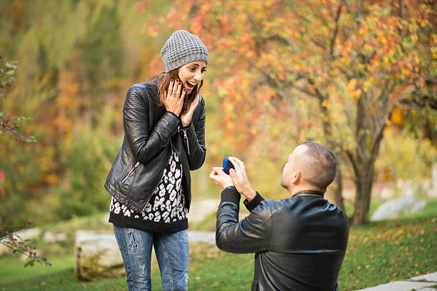 istock Autumn outdoor wedding proposal engagement 492765840