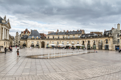 Dijon, France - August 16, 2015: Place de la Libération in Dijon, France. The layout of the Place Royale takes place between 1681 and 1686 on the site of a small square St Kitts and dilapidated buildings depending on the palace of the Dukes. The task is performed by Jules Hardouin-Mansart3.