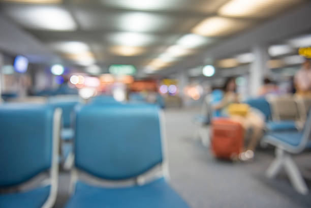 istock Blur focus of traveler waiting flight at the gate. 492766652