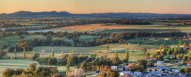 Early morning views Cowra Sunlight across the frosty fields around  the Cowra district just after the first rays of sunlight burst forth from the ranges. cowra stock pictures, royalty-free photos & images