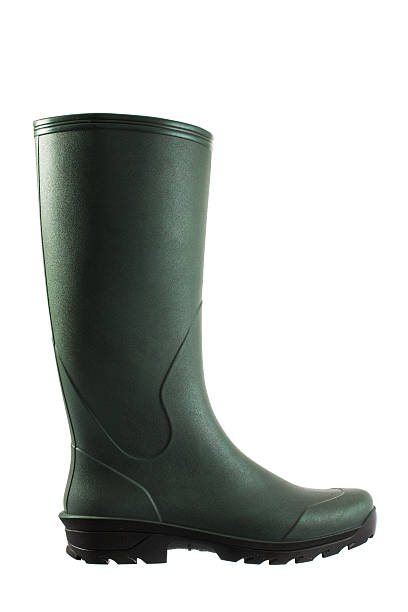 istock Green rubber boots isolated on white background 492774960