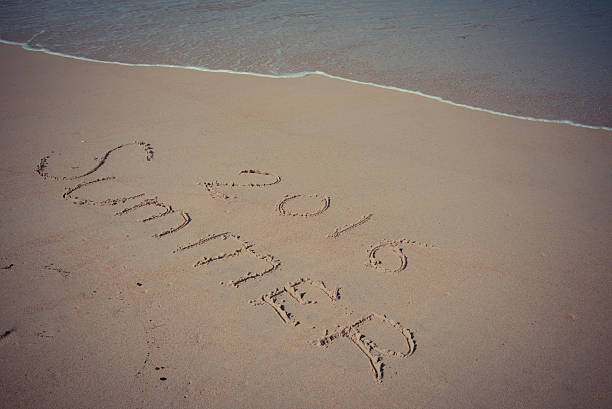 istock Retro photo Summer 2016 hand writing on the beach 492775816