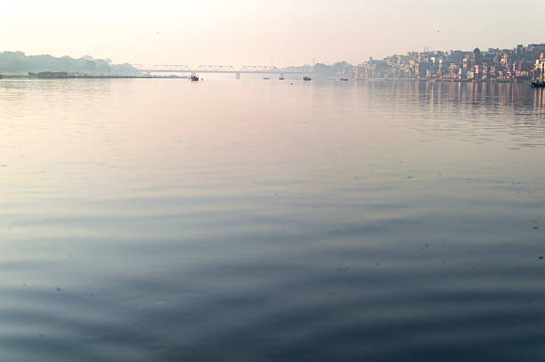 istock River with boats and town 492776352