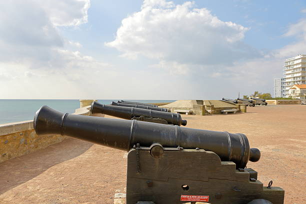 istock Battery of old guns by the sea 492777086