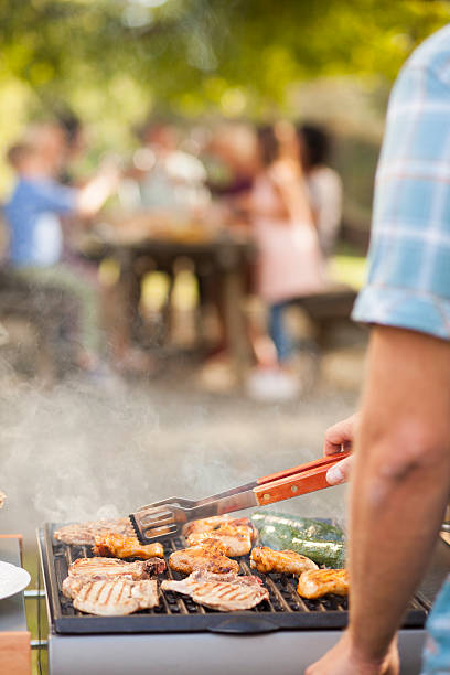 istock Preparing barbecue meal for family 492779522